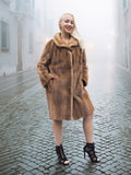 Classic pastel brown mink fur coat stroller jacket M/L with hands in pockets. Elegant and cozy outerwear for women in natural fur.