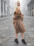 Back view of classic pastel brown mink fur coat stroller jacket M/L worn off-shoulder. Soft, silky mink pelts in preserved condition.