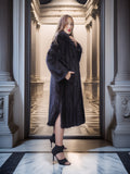 Woman in a black fur coat standing in an elegant interior setting