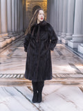 Elegant full-length La Galleria mink fur coat in mahogany, styled with tie-neck and black boots, ideal for luxury winter outerwear.