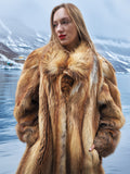 Close-up of vintage red fox coat by a lake