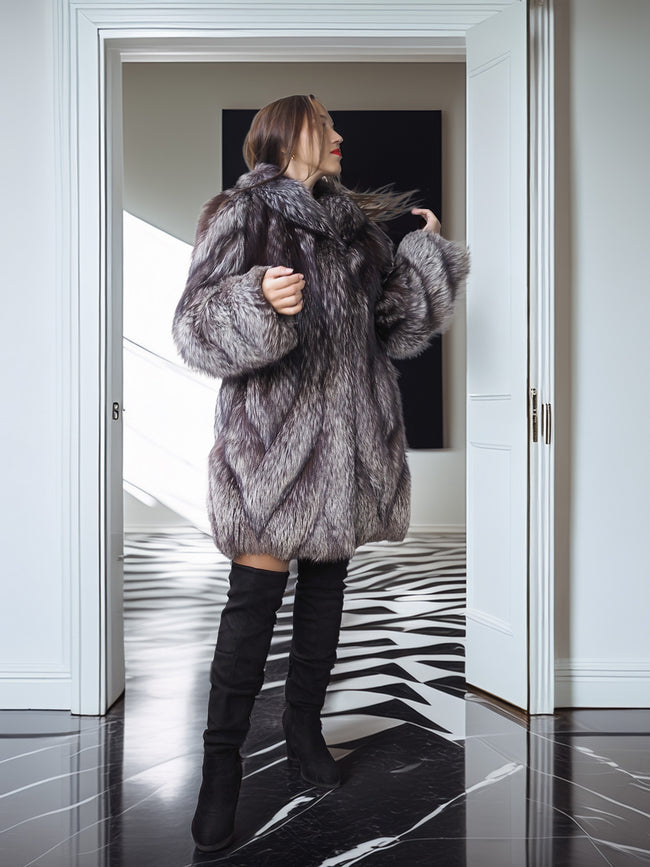 Person wearing a fur coat in a modern interior setting