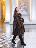 Model walking confidently in Brand New Luxurious Demi Buff Swing Canadian Mink Fur Coat L/XL, highlighting its luxurious drape.