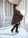 Model twirling in Brand New Luxurious Demi Buff Swing Canadian Mink Fur Coat L/XL, emphasizing its natural fur movement and volume.