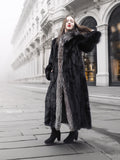 Full-length black mink coat with indigo fox collar, ideal for luxury winter fashion in medium to large sizes.
