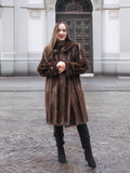 Classic dark brown mink fur coat with front button detail, styled for medium size in the vintage outerwear collection.