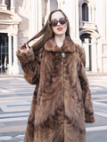 Espresso Mink Long Coat - Regal Swing with buttoned collar, styled with sunglasses and black boots for refined winter fashion.