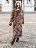 Espresso Mink Long Coat - Regal Swing walking across plaza, showcasing natural mink texture and luxurious full-length design.