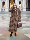 Espresso Mink Long Coat - Regal Swing worn with black boots and brown handbag, highlighting luxurious fur texture and full-length silhouette.