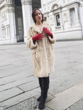 Beige Mink Fur Coat - Vintage Luxury paired with black boots. Natural fur coat for elegant cold-weather fashion.
