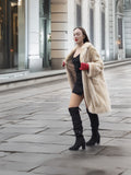 Vintage Beige Pearl Mink Fur Coat S/M styled with red gloves. Chic and cozy mink coat for urban winter fashion.