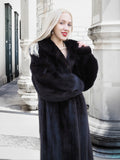 Black mink fur coat, stylish lady posing outdoors