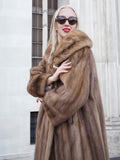 Vintage pastel Canadian brown mink fur coat with oversized collar and cuffs. Elegant stroller style design in a luxurious, fashionable look.