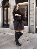 Majestic Opera Mink vintage mink coat in rich mahogany, styled with black thigh-high boots for elegant winter fashion in a city setting.