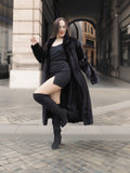 Midnight Sonata black mink coat paired with a black mini dress, blending modern glamour with classic fur fashion.