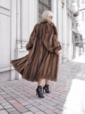 Luxurious pastel Canadian brown mink fur coat with silk lining, showcasing elegance and sophistication.