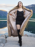 Open Finnish Raccoon Fur Coat with beige satin lining, worn over black mini dress, showcasing luxury fur fashion details.