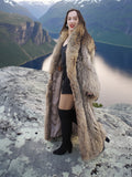 Model in Finnish Raccoon Fur Coat with satin lining and thigh-high boots, styled for winter fashion on mountain cliff.