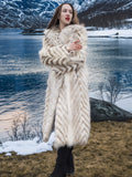 Two Tone Fox Coat with chevron pattern and shawl collar, worn in a lakeside winter landscape, showcasing stylish fur fashion in size XS/S.