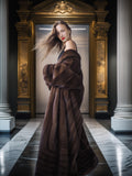 Woman in a brown fur coat standing in an elegant interior setting with classical architecture.