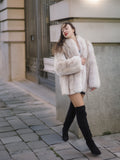 Model walking in Brown Cross Mink Fur Coat Jacket S with Blush Fox Trim, showcasing its plush texture and fashionable winter appeal.