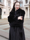 Elegant NAFA mink fur coat with a classic wing collar, styled for a sophisticated winter fashion statement.