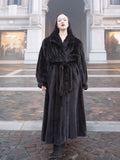 NAFA black mink fur coat for women with a belted waist, wing collar, and fold-back cuffs, offering a sophisticated winter look.