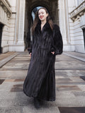 NAFA black mink fur coat with a flowing silhouette, styled for a luxurious and timeless winter fashion look.