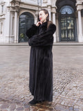 NAFA black mink fur coat styled for a sophisticated winter look, highlighting its plush texture and timeless appeal.