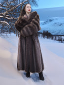 Canadian Raccoon Fur Coat - Silver Tips M styled in snowy landscape. Luxurious and stylish winter outerwear for cold climates.