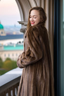 Brown mink coat back and shoulders, textured fur, relaxed swing length