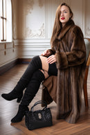 Mink coat with shawl collar and button, dark brown fur; seated styling