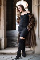 Fine mink coat with hood and fur cuffs, open-front swing style over a dress