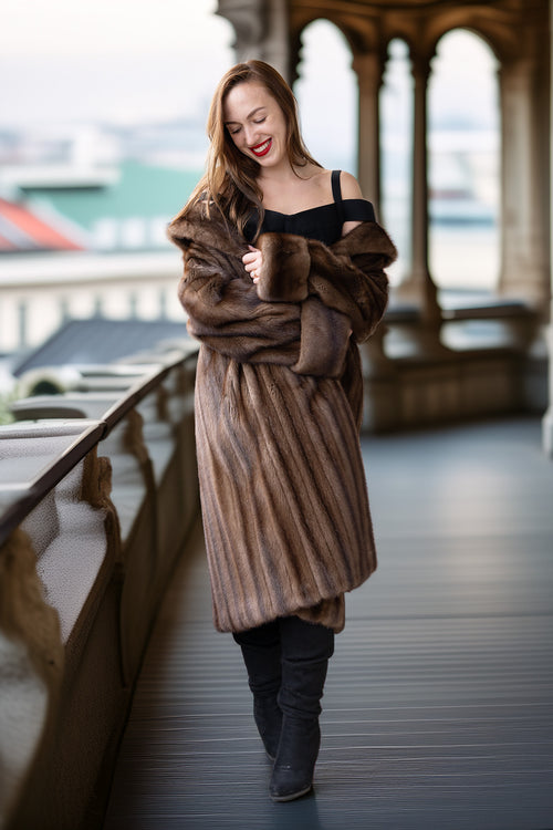 Demi-buff mink swing coat with wide collar and draped sleeves