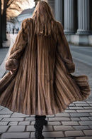 Fine mink coat back view, hood detail and flared swing hem with full sleeve drape