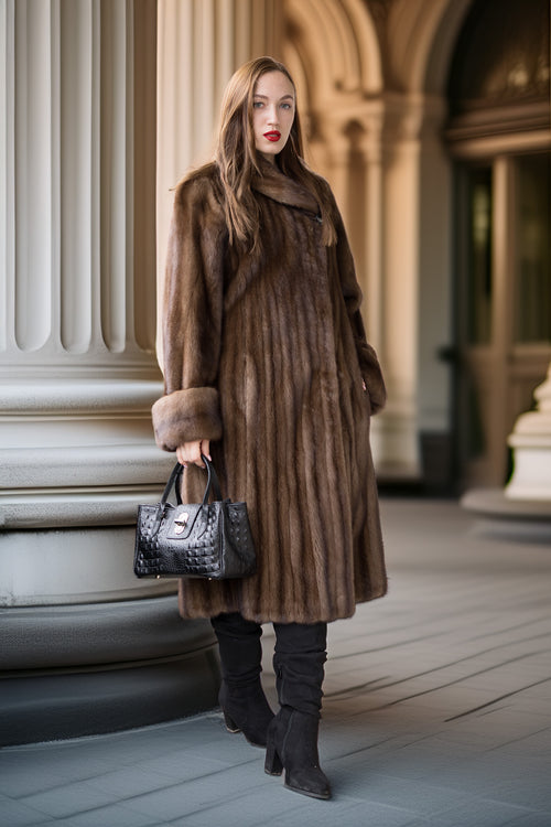 Fine mink coat with hood, vertical fur paneling, long sleeves and full swing skirt