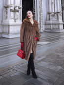 Vintage pastel Canadian brown mink fur coat styled for elegant winter wear, paired with red gloves and black boots for a refined look.