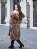 Back view of vintage pastel Canadian brown mink fur coat in S/M, highlighting its plush fur and flattering silhouette for timeless winter style.