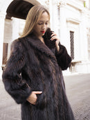 Close-up of woman in dark fur coat, elegant pose