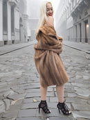 Back view of classic pastel brown mink fur coat stroller jacket M/L worn off-shoulder. Soft, silky mink pelts in preserved condition.