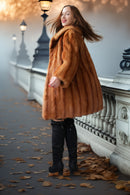 Vintage mink fur coat with hood in orange-brown; front view with flared sleeves