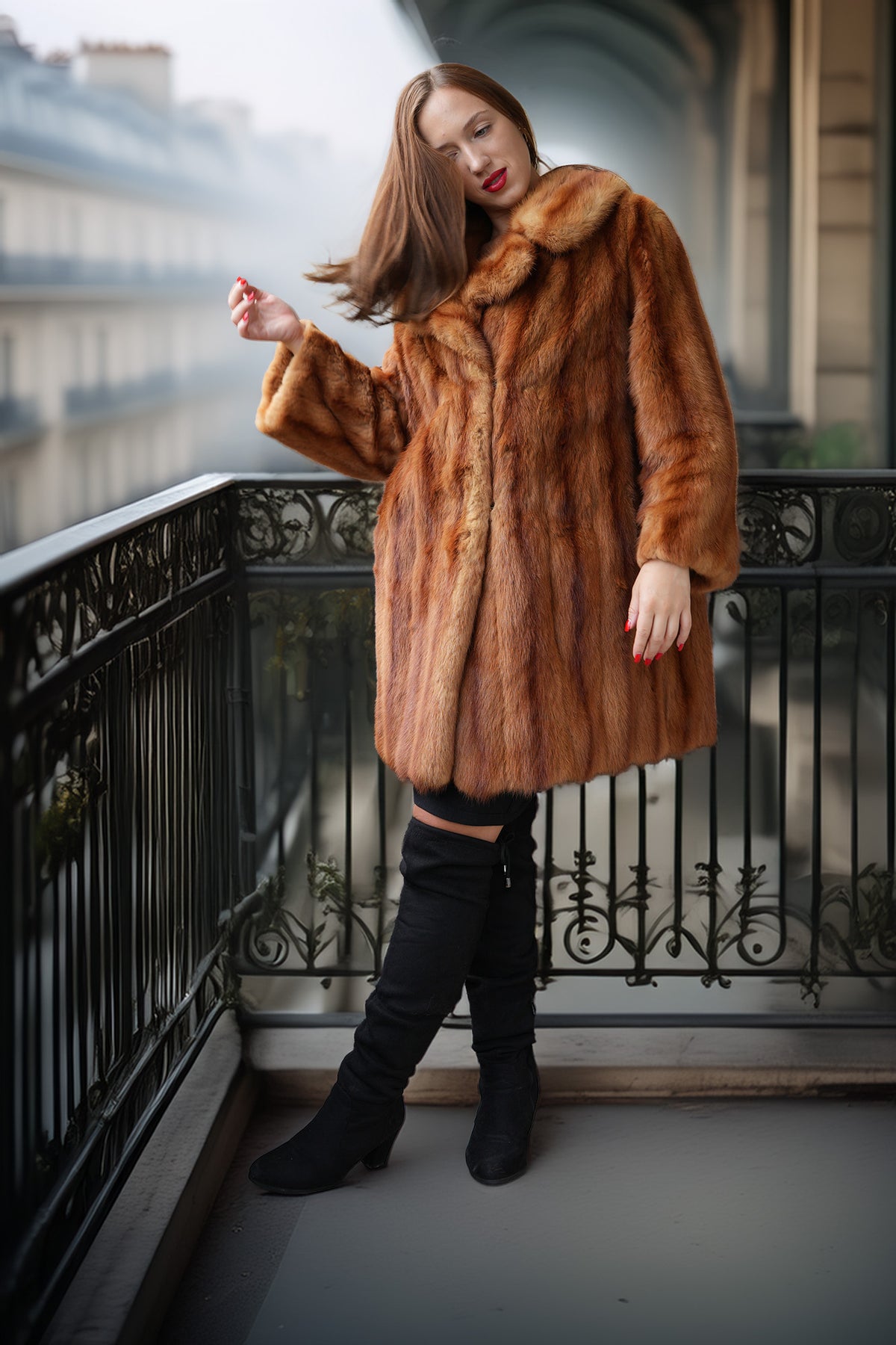 Vintage mink fur coat with hood, orange-brown; front view standing on steps