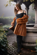Vintage mink fur coat with hood, orange-brown; open design with plush collar