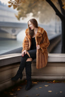 Vintage mink fur coat with hood, orange-brown; cropped look with black boots