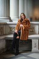 Vintage mink fur coat with hood in orange-brown; relaxed fit with full front length