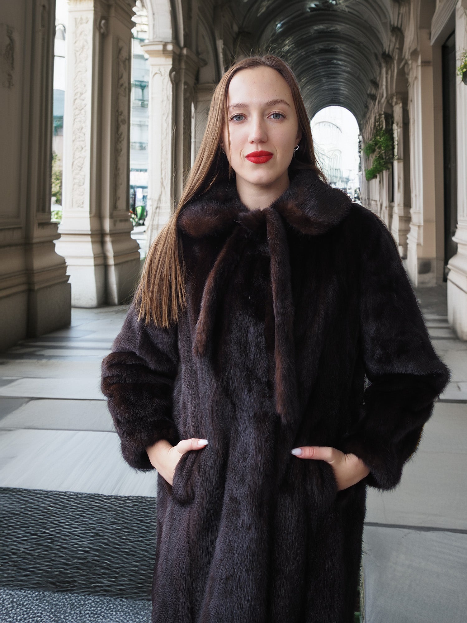 Close-up of La Galleria vintage mink fur coat featuring tie-neck detail and plush mahogany fur, ideal for cold-weather elegance.