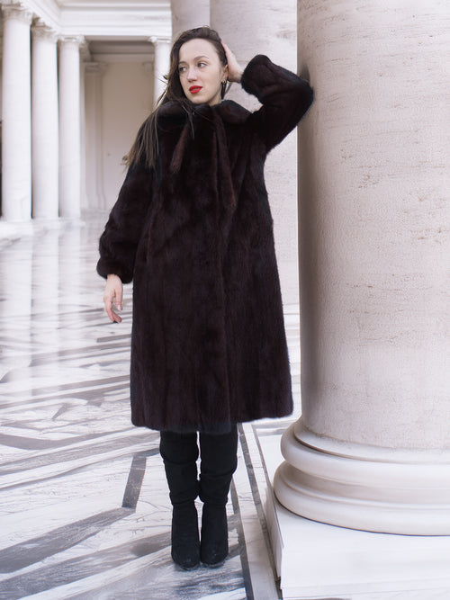 La Galleria vintage mink fur coat in rich mahogany, styled with black boots and satin lining, perfect for luxury outerwear collections.