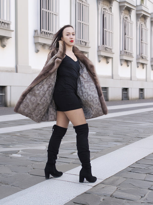 Canadian mink fur jacket L/XL 16 with satin lining and herring bone pattern, shown open over a black mini dress and thigh-high boots.