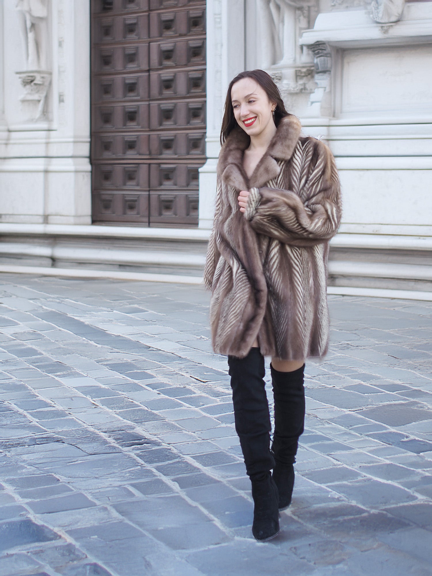 Model walking in Brand New Canadian Mink Fur Jacket L/XL 16 with rich herring bone design and plush texture, ideal for winter fashion.