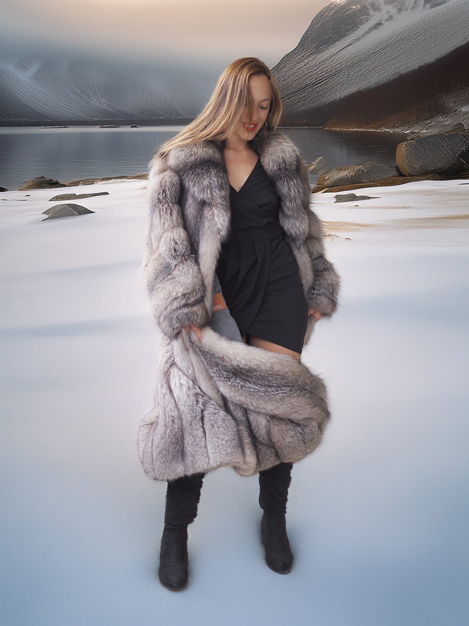 Woman in a fur coat standing in a snowy landscape with mountains in the background